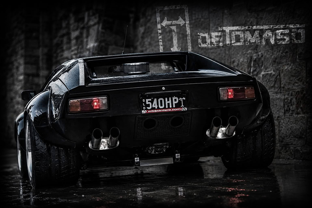 Black DeTomaso Pantera Group 4, photographed from the rear