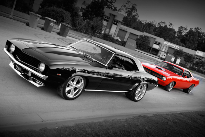 Click Here - to see Hemi Cuda VS 69 Camaro Pics!